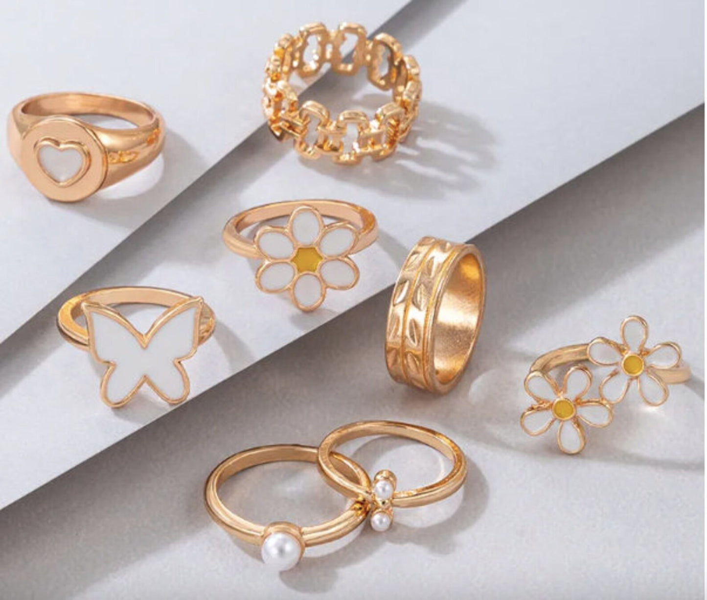 Floral Set of Gold and White Rings